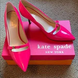 Kate Spade Pink Patent Bow pumps with a black heel